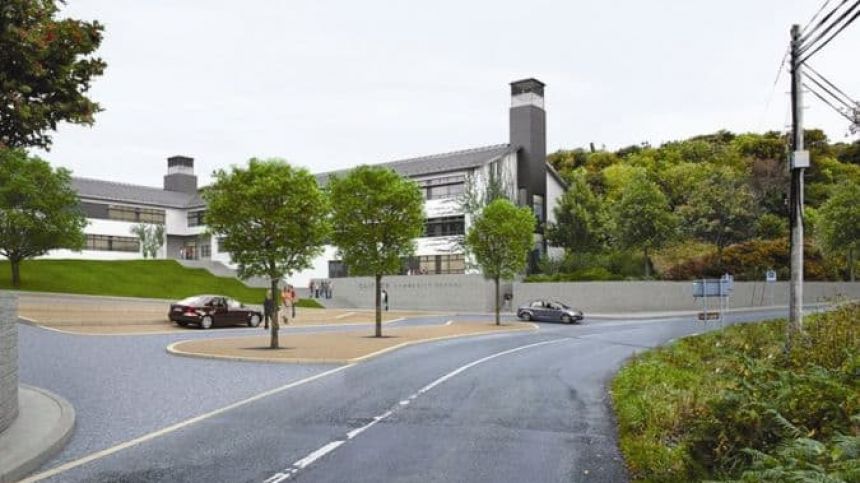 Taoiseach confronted by post office protest as he officially opens Clifden Community School