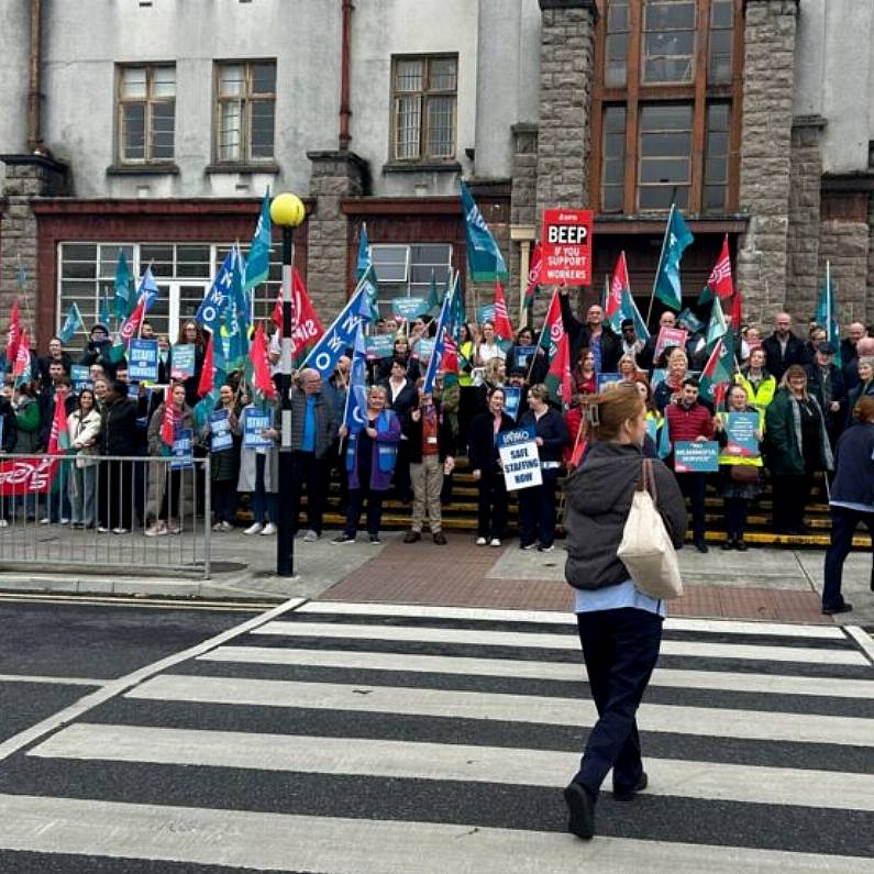 Approximately 100 healthcare workers protest outside UHG