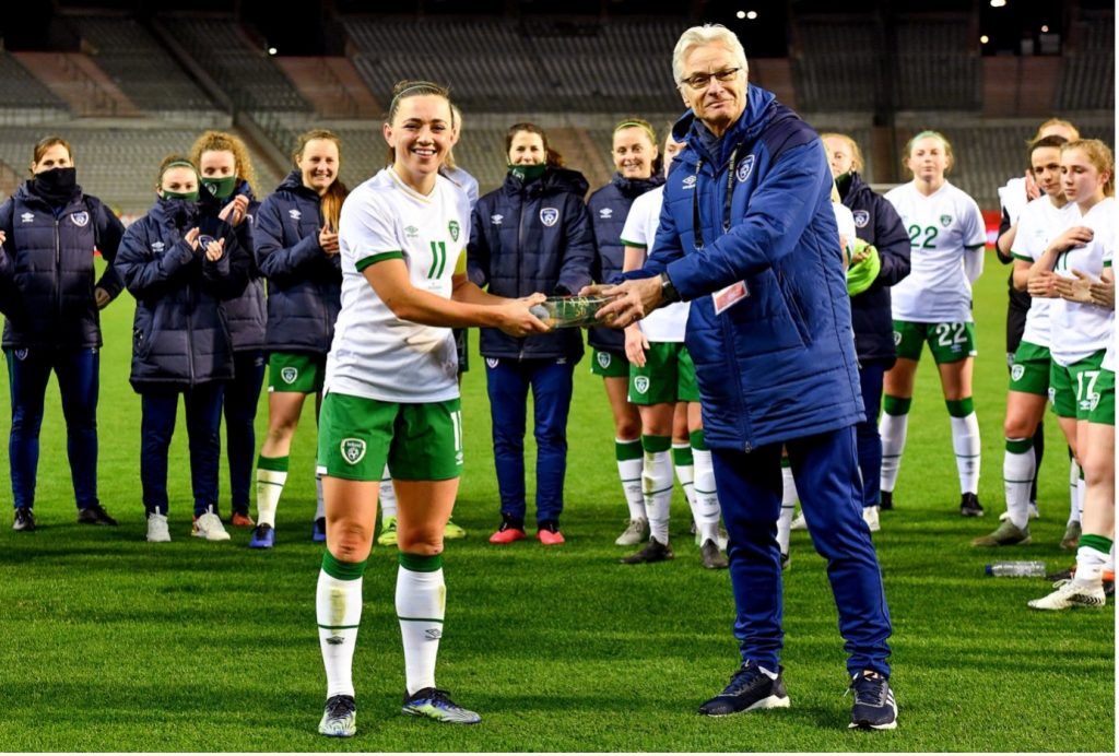 Republic of Ireland WNT captain Katie McCabe receives a special 50th cap from FAI High Performance Director Ruud Dokter. Photo: SPORTSFILE.