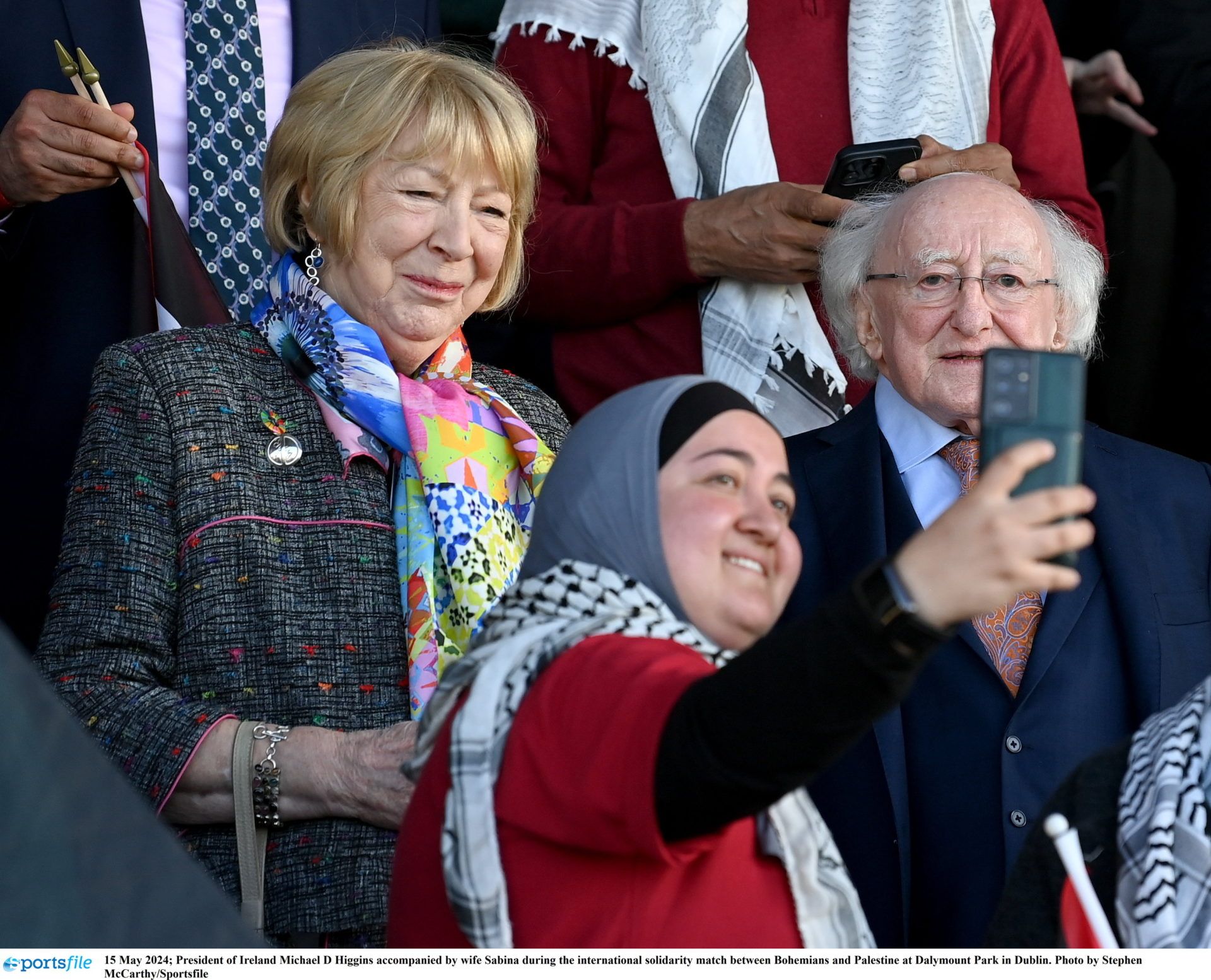 15 May 2024; President of Ireland Michael D Higgins accompanied by wife Sabina during the international solidarity match between Bohemians and Palestine at Dalymount Park in Dublin. Photo by Stephen McCarthy/Sportsfile