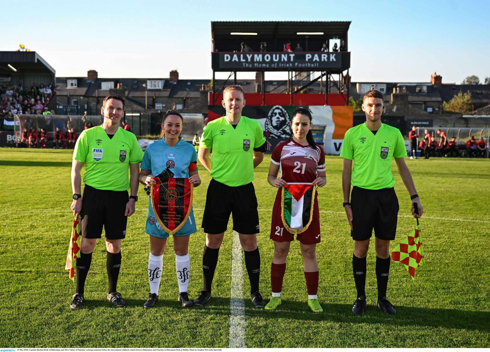 15 May 2024; Captains Rachael Kelly of Bohemians and Mira Natour of Palestine exchange pennants before the international solidarity match between Bohemians and Palestine at Dalymount Park in Dublin. Photo by Stephen McCarthy/Sportsfile