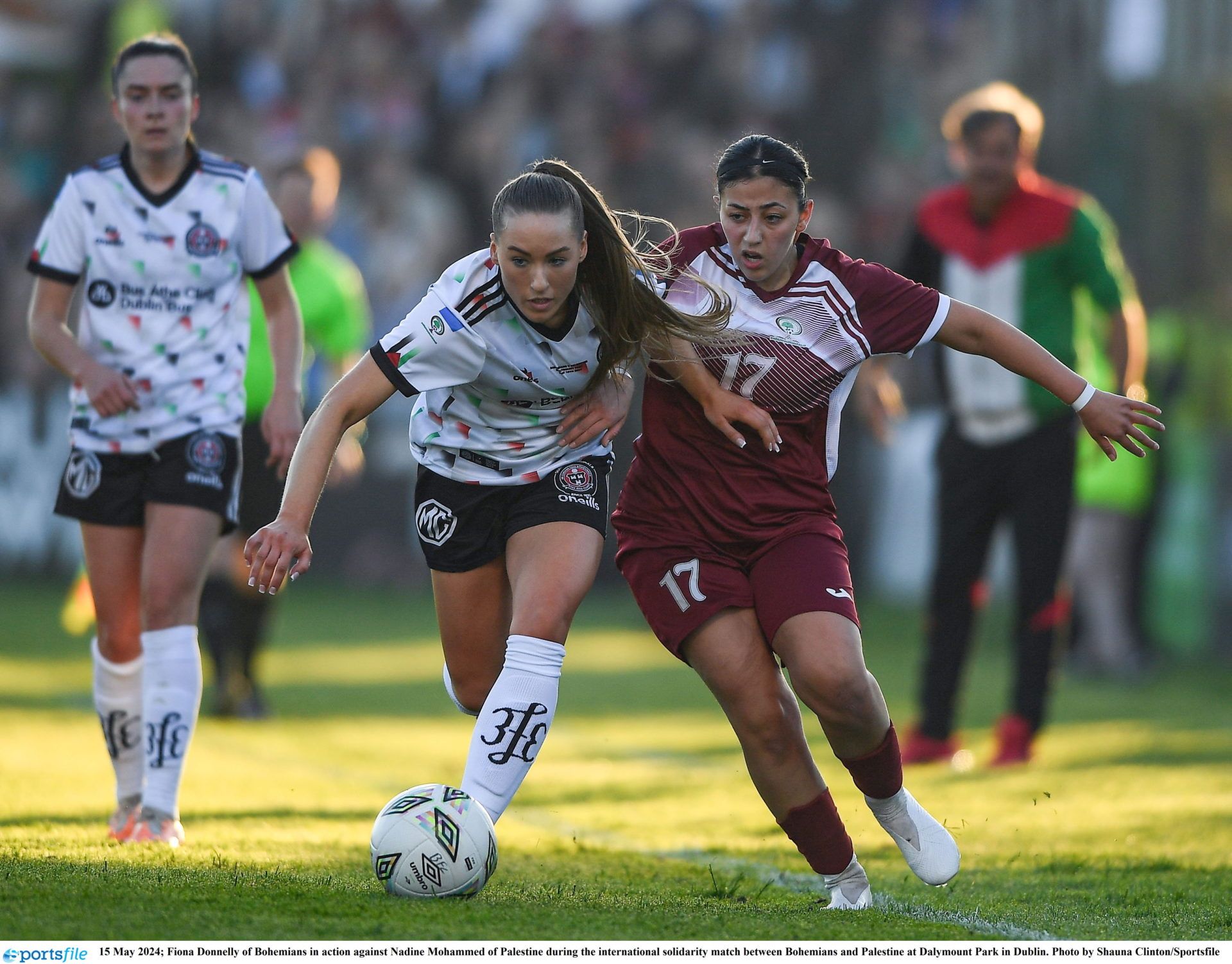 15 May 2024; Fiona Donnelly of Bohemians in action against Nadine Mohammed of Palestine during the international solidarity match between Bohemians and Palestine at Dalymount Park in Dublin. Photo by Shauna Clinton/Sportsfile