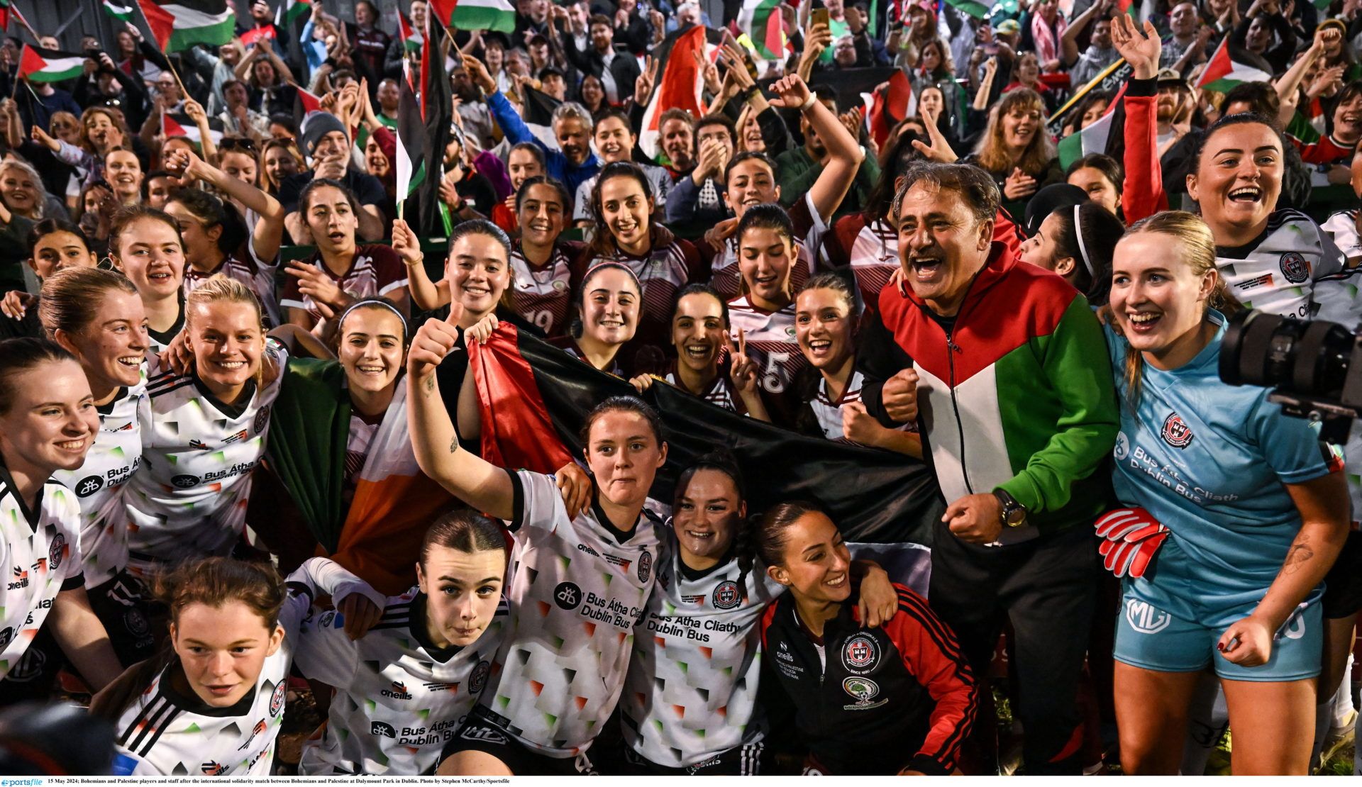 15 May 2024; Bohemians and Palestine players and staff after the international solidarity match between Bohemians and Palestine at Dalymount Park in Dublin. Photo by Stephen McCarthy/Sportsfile