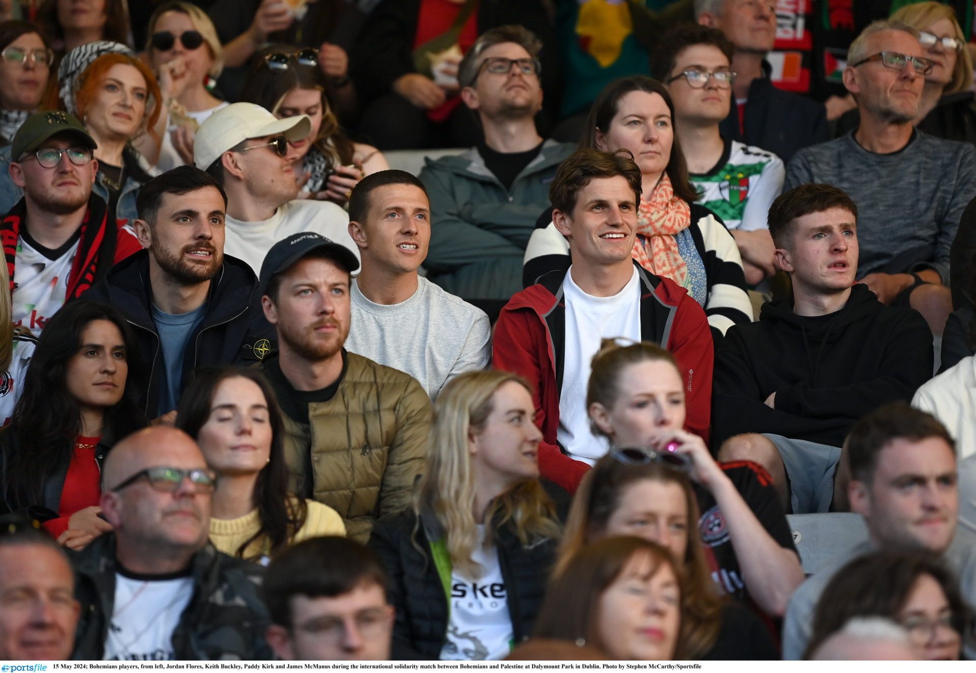 15 May 2024; Bohemians players, from left, Jordan Flores, Keith Buckley, Paddy Kirk and James McManus during the international solidarity match between Bohemians and Palestine at Dalymount Park in Dublin. Photo by Stephen McCarthy/Sportsfile