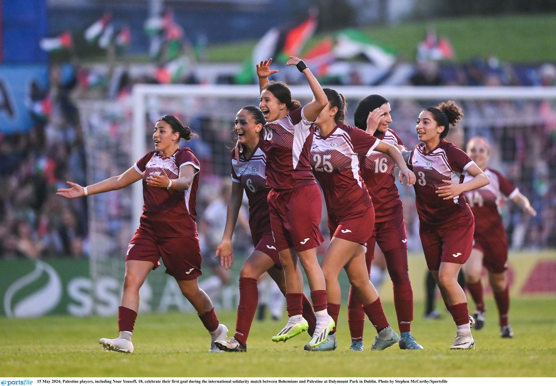 15 May 2024; Palestine players, including Nour Youseff, 18, celebrate their first goal during the international solidarity match between Bohemians and Palestine at Dalymount Park in Dublin. Photo by Stephen McCarthy/Sportsfile