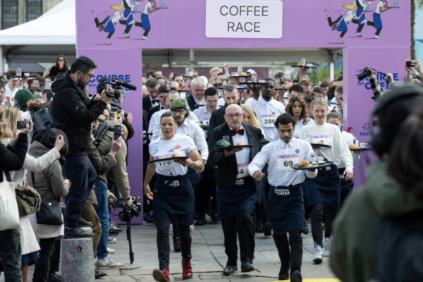 164 Waiters And Waitresses Take Part In Course des Cafés In Paris