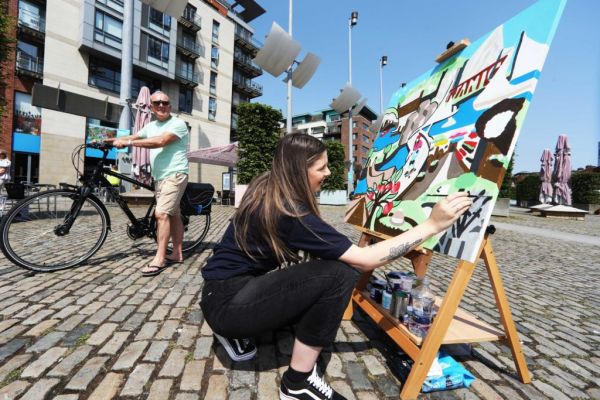 Street Artist Paints Picture To Promote Northern Ireland In Dublin