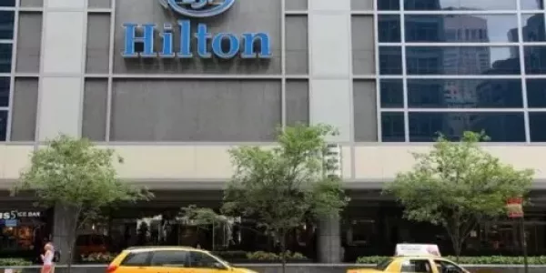Hilton Lifts Profit Forecast On International Travel Demand