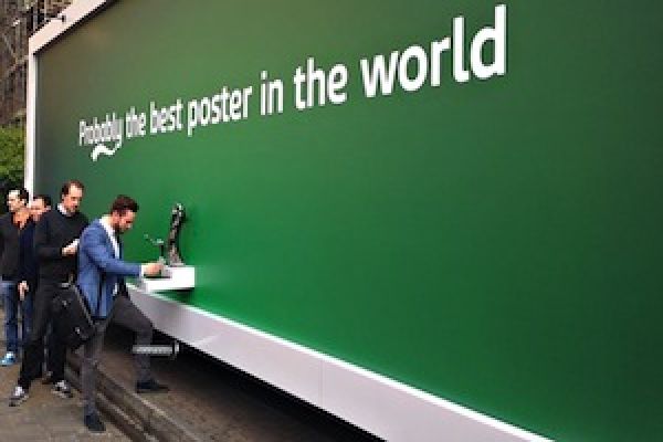 Carlsberg Billboard Dispenses Beer to Passers-By