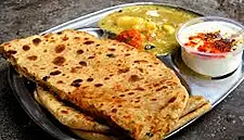 Hot Indian Curry House Leaves London's Brick Lane in the Dust