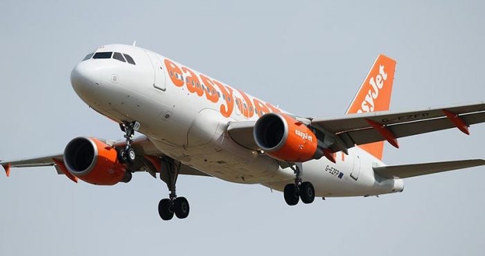 easyJet passenger wears 15 shirts and jumpers on flight to avoid baggage  fee, The Independent