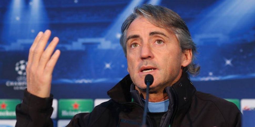 Mancini snaps at reporters as...