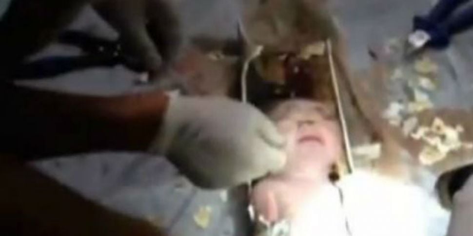 Baby found alive in pipe after...