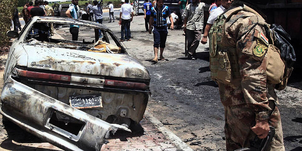 Wave of car bombs kills 48 in...