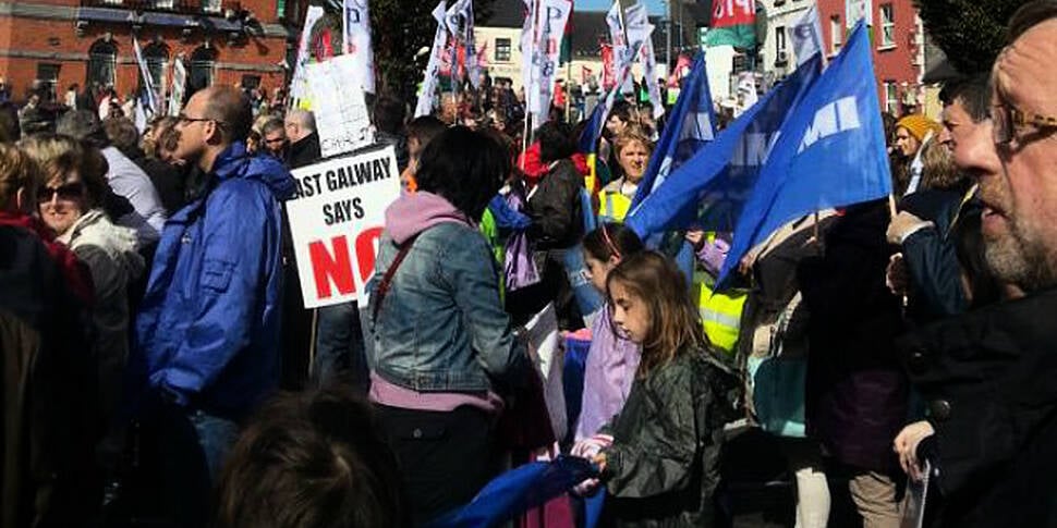 Protestors march against propo...