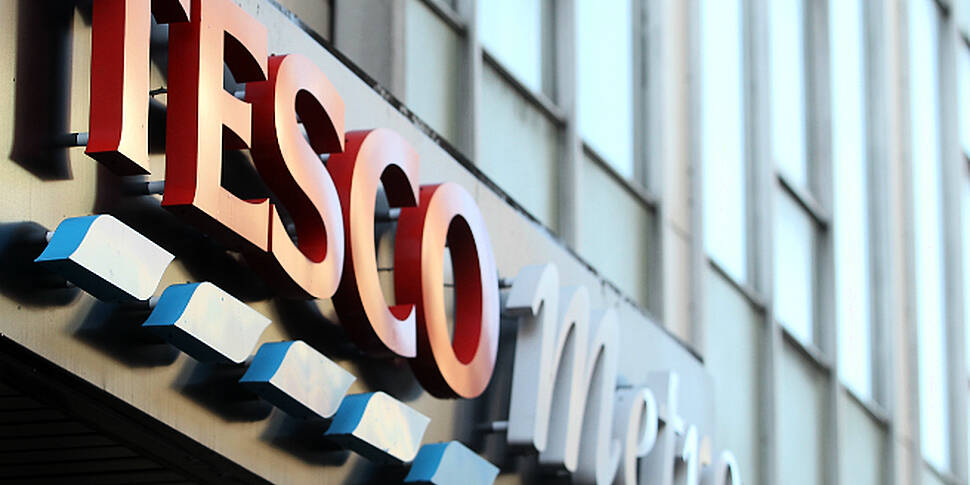 Tesco reports sharp drop in sa...