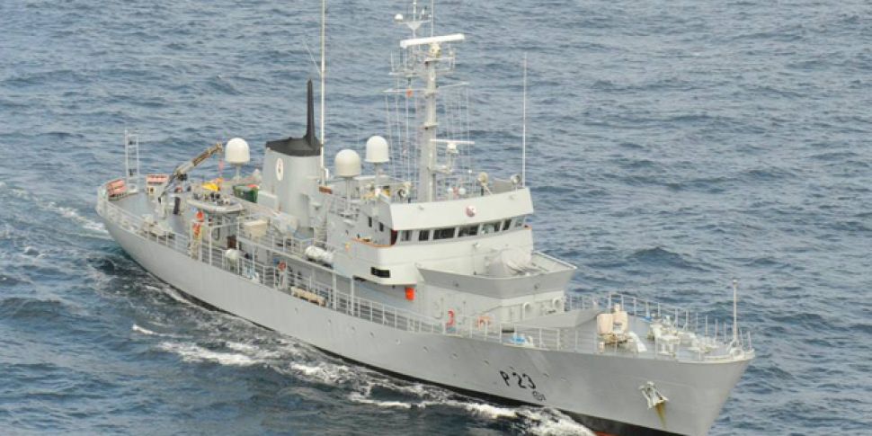 Navy tows stricken ship off th...