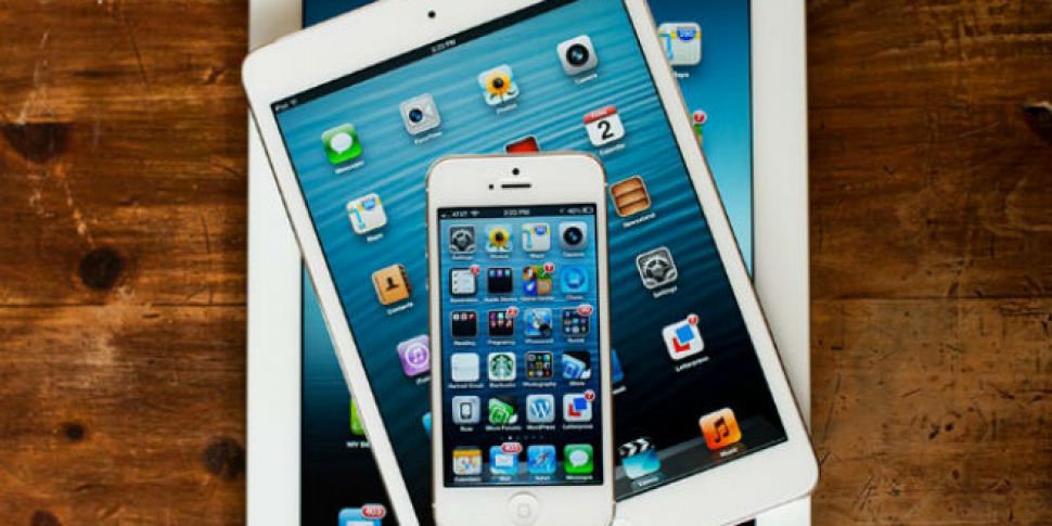 Apple sees record iPhone, iPad...