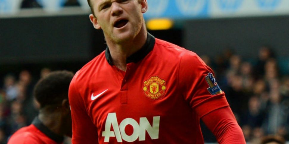Rooney commits to United with...