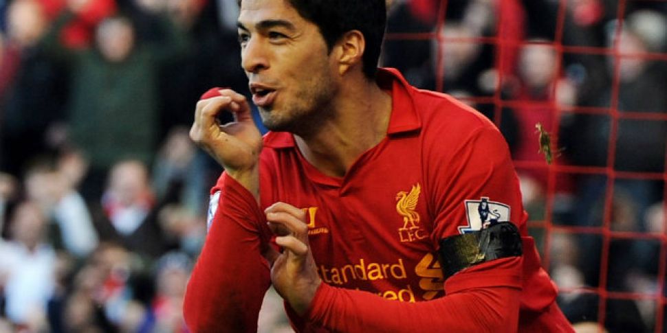 Luis Suarez gets in on the ant...