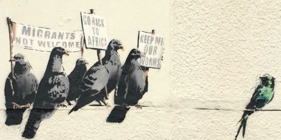 Council covers up Banksy graff...