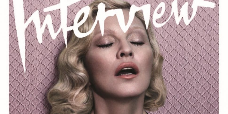 Madonna poses topless for Inte...