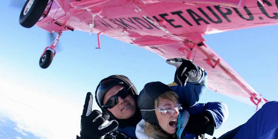 Skydivers jump from plane befo...