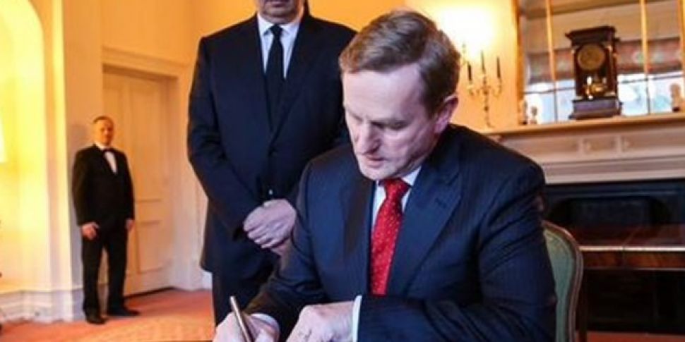 VIDEO: Taoiseach signs book of...