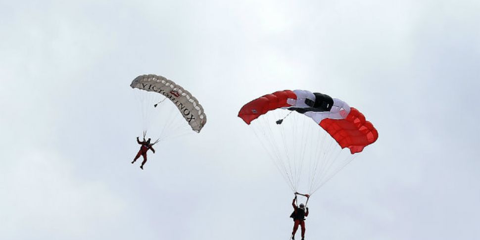 Parachutist saved by colleague...