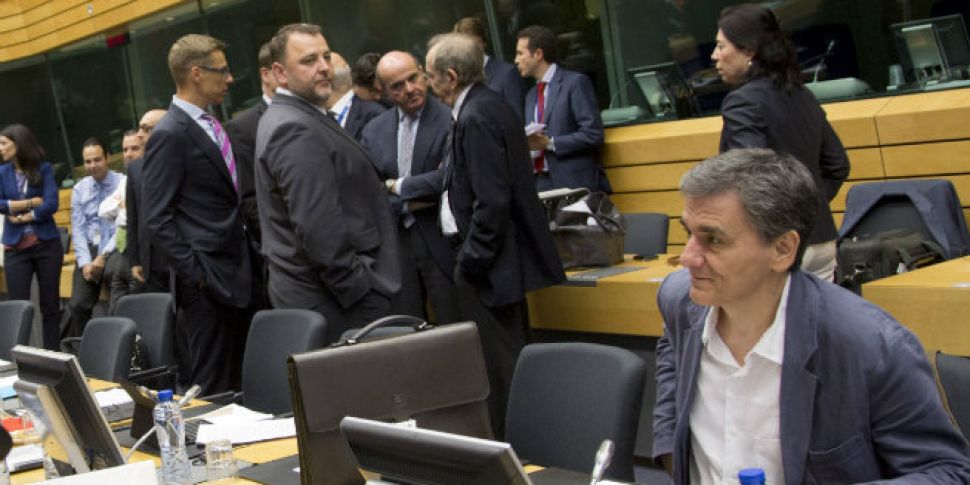 Greek talks resume amid tense...