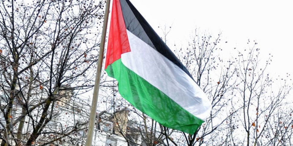 WATCH: Palestinian flag flies...