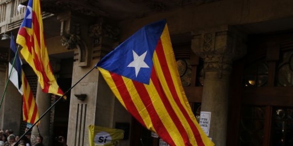 Spanish police raid Catalan go...