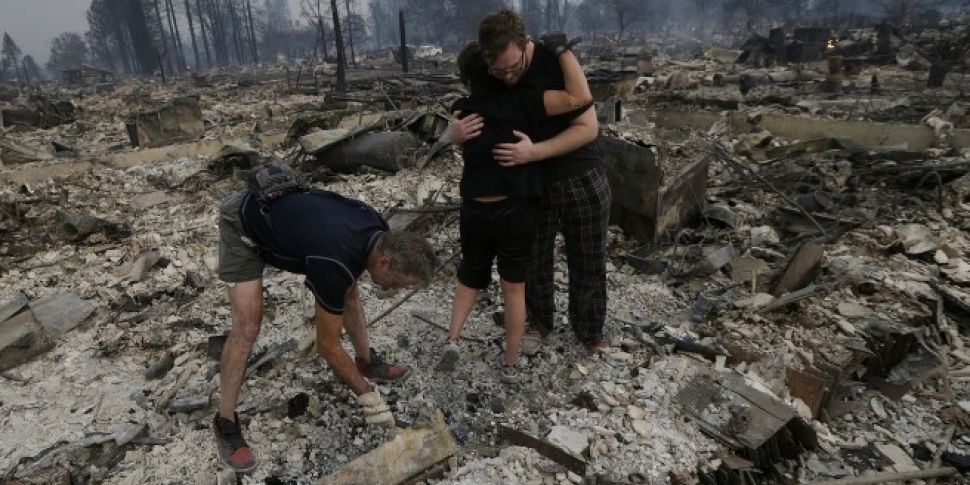 Ten dead as wildfires rage acr...