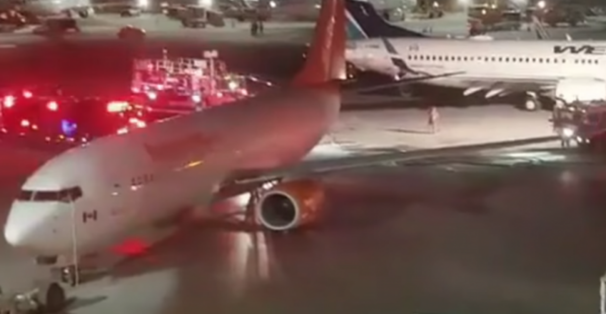 VIDEO Passengers forced to evacuate after two plane collision at