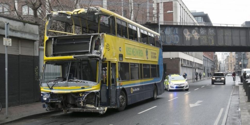 Double-decker bus severely dam...