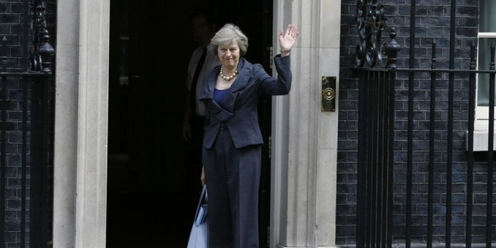 Theresa May leads tributes to...