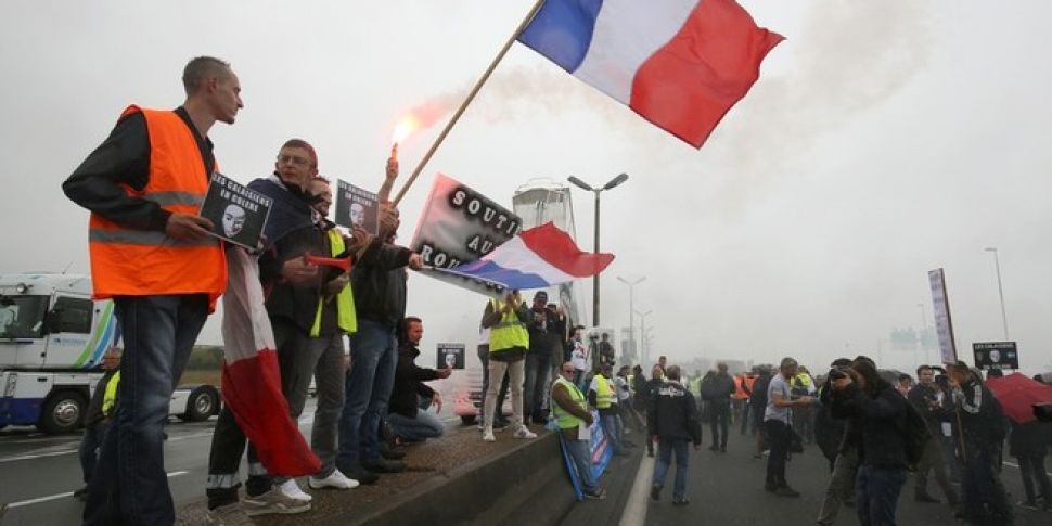 French truckers block major hi...