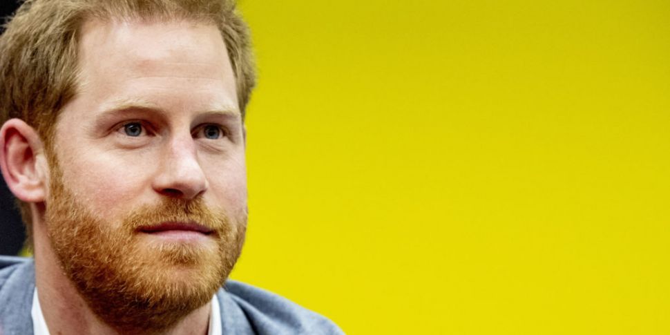 Britain's Prince Harry accepts...