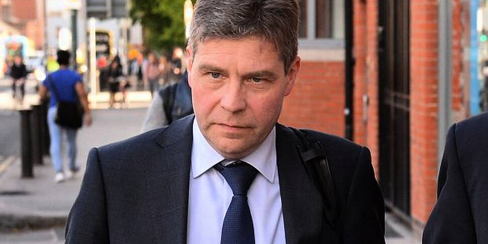 Justice Minister Charlie Flana...