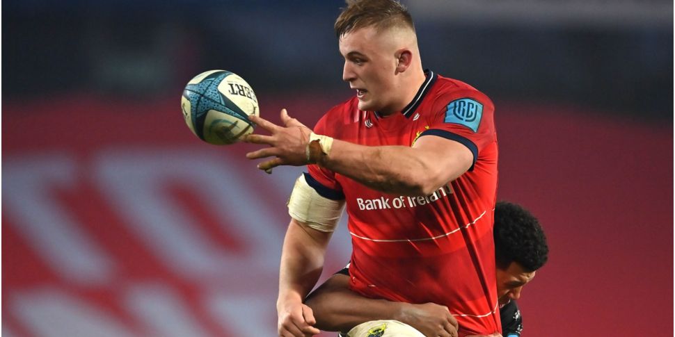 Munster's Gavin Coombes signs...