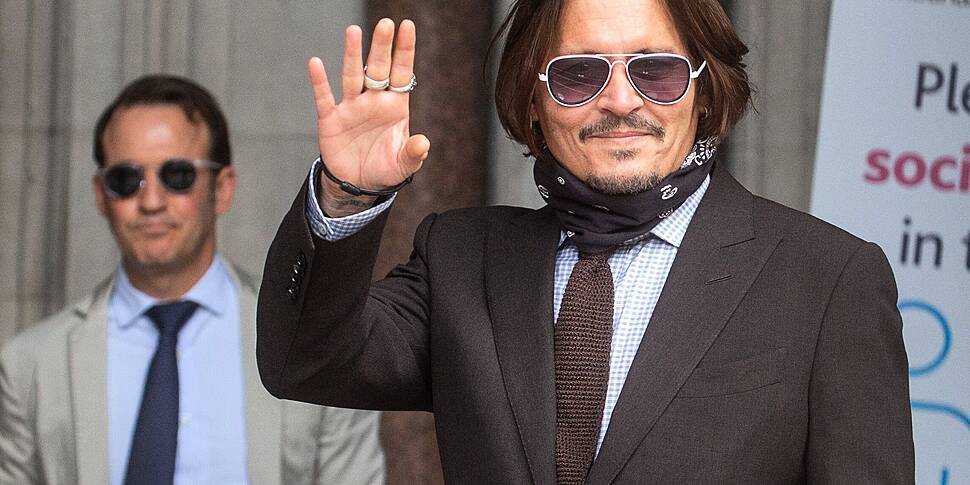 Johnny Depp and Amber Heard en...