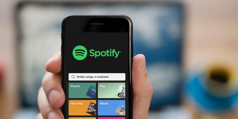 Spotify to cut "about 6%&...