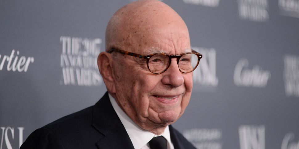 Rupert Murdoch steps down as c...