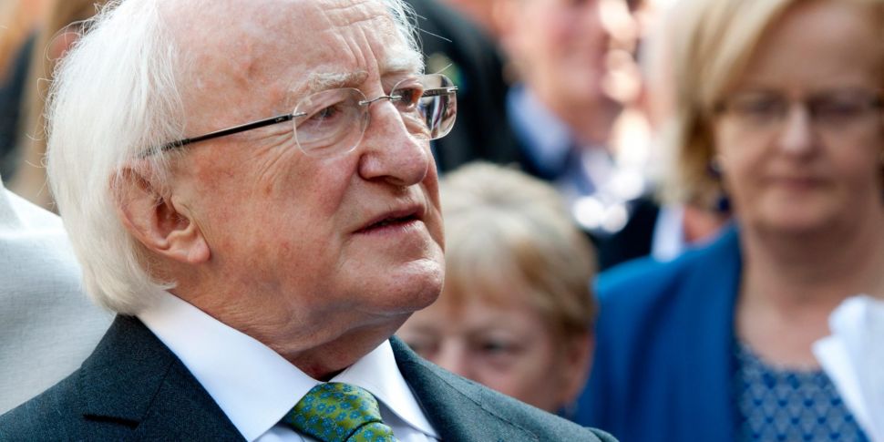 President Higgins to remain in...