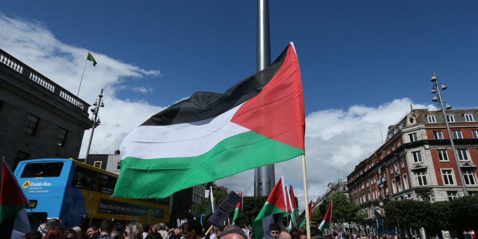 Should the Palestinian flag fl...