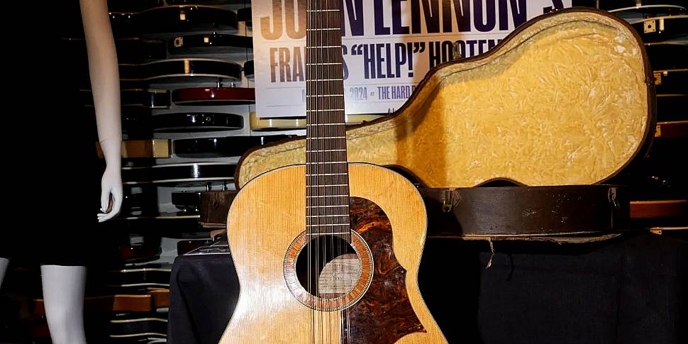 John Lennon’s Guitar sells for...