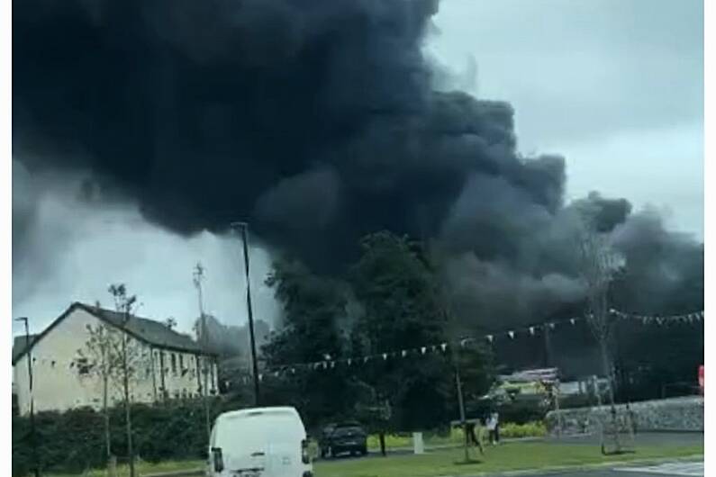 Emergency services tackle blaze at Clones business