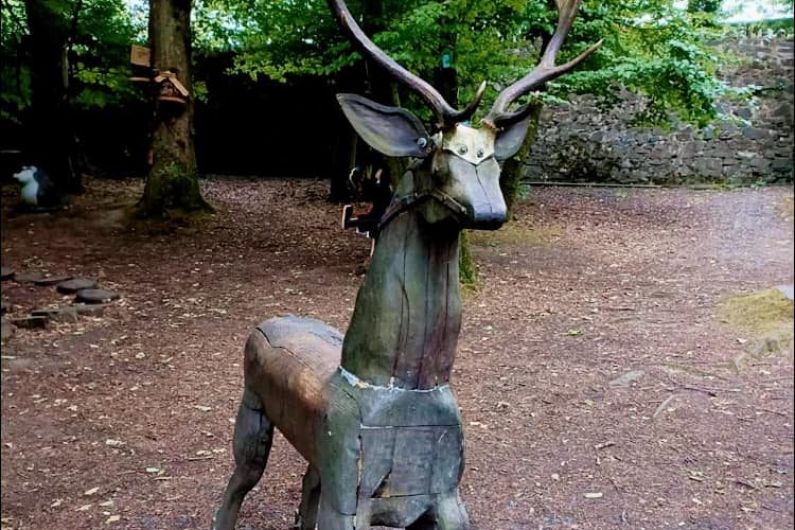 Damaged wooden sculpture in local forest park 'restored to his proud self'