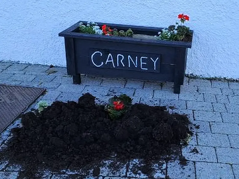 Questions asked over toppled flower box in Carney