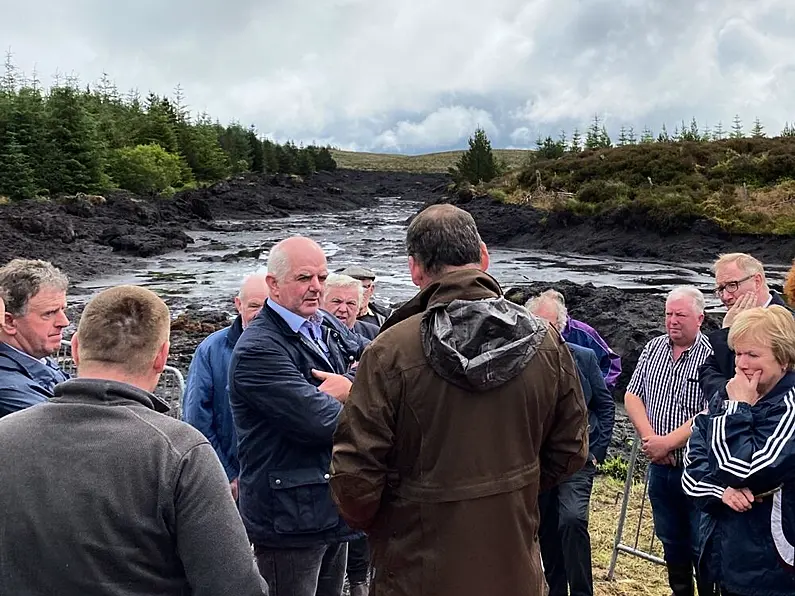 Barry Cowen visits Drumkeerin landslide devastation